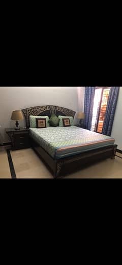 king SIze Bed with two side tables and dressesr