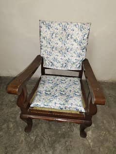 Wooden chairs with cushions