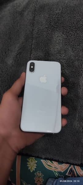 iPhone xs white colour pta prove all ok 64 gb bettry 80 % 0