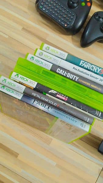 Xbox 360 e slim original saudia imported with Kinect and games 2