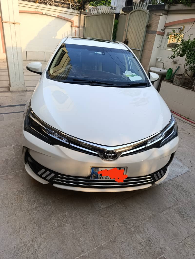 Corolla Grande white   2019 Full Genuine 2