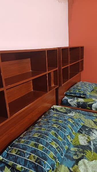 2 single bed with shelves for books and big drawers  for other stuff 6