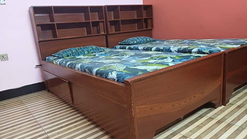 2 single bed with shelves for books and big drawers  for other stuff 8