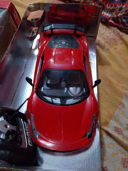 Red color big china car with new battery remote and original adapter 2