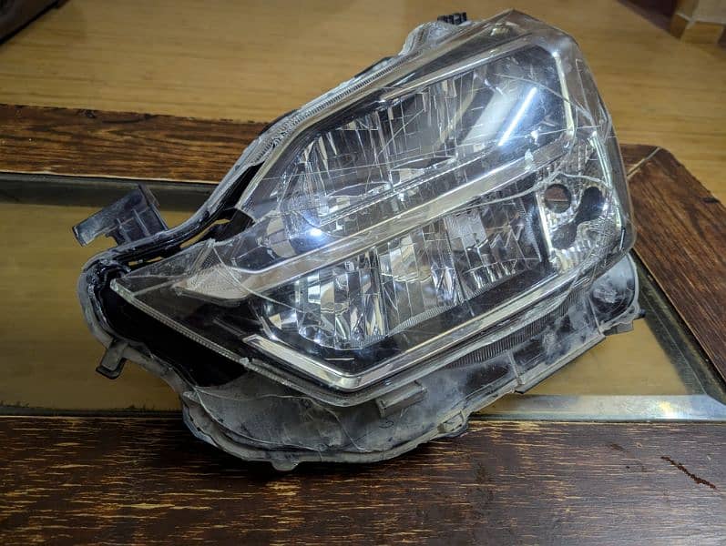 Daihatsu Mira EIS Head Light (left side) 1