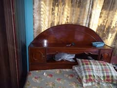 wooden bed with matres