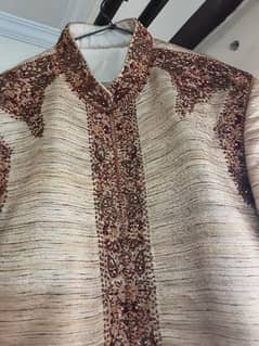 men wedding raw. silk shirwani in cream color