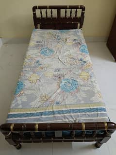 single wooden bed