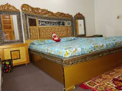 double bed,side tables and dressing.