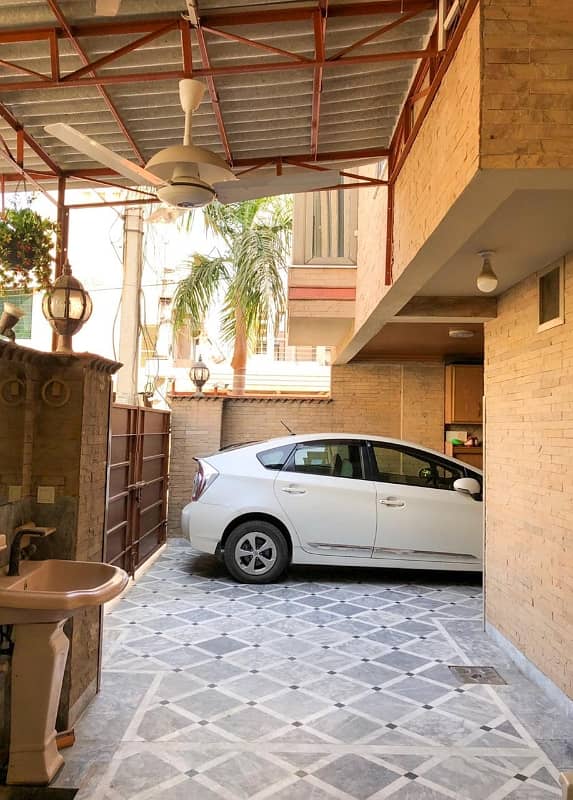 10 Marla corner double story house For Sale near ghazi Chocollege road 5 bedroom with attached washroom TV lounge kitchen drying dining room store tiles flooring good location All facility available neat and clean house water electricity sui gas availab 1