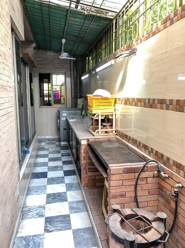 10 Marla corner double story house For Sale near ghazi Chocollege road 5 bedroom with attached washroom TV lounge kitchen drying dining room store tiles flooring good location All facility available neat and clean house water electricity sui gas availab 4