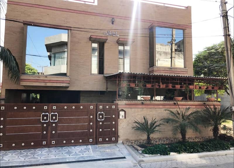 10 Marla corner double story house For Sale near ghazi Chocollege road 5 bedroom with attached washroom TV lounge kitchen drying dining room store tiles flooring good location All facility available neat and clean house water electricity sui gas availab 7