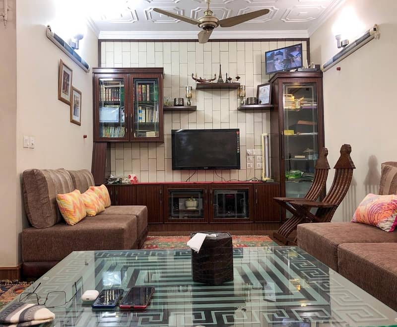 10 Marla corner double story house For Sale near ghazi Chocollege road 5 bedroom with attached washroom TV lounge kitchen drying dining room store tiles flooring good location All facility available neat and clean house water electricity sui gas availab 10