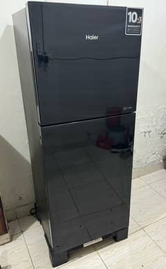 new Haier fridge in glass black