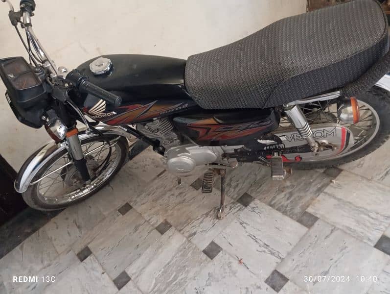 honda 125 2021 model full lush condition 
all punjab nmber 5