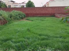 1 Kanal Commercial Plot For Sale In Moza Juliana, Contiguous( Attached) With Bahria Town Wall. .