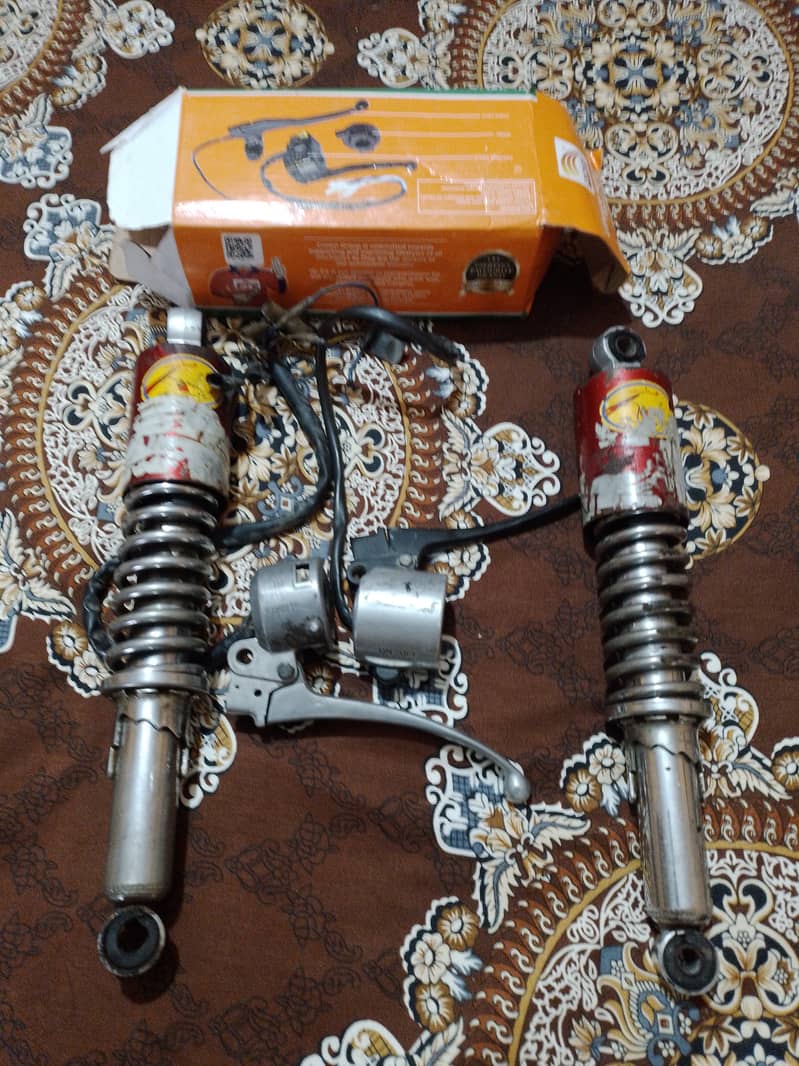 Back  Shocks  with good condition and  two lever 3