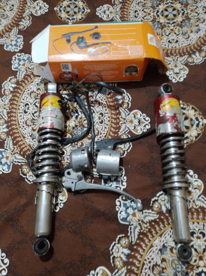 Back  Shocks  with good condition and  two lever 4