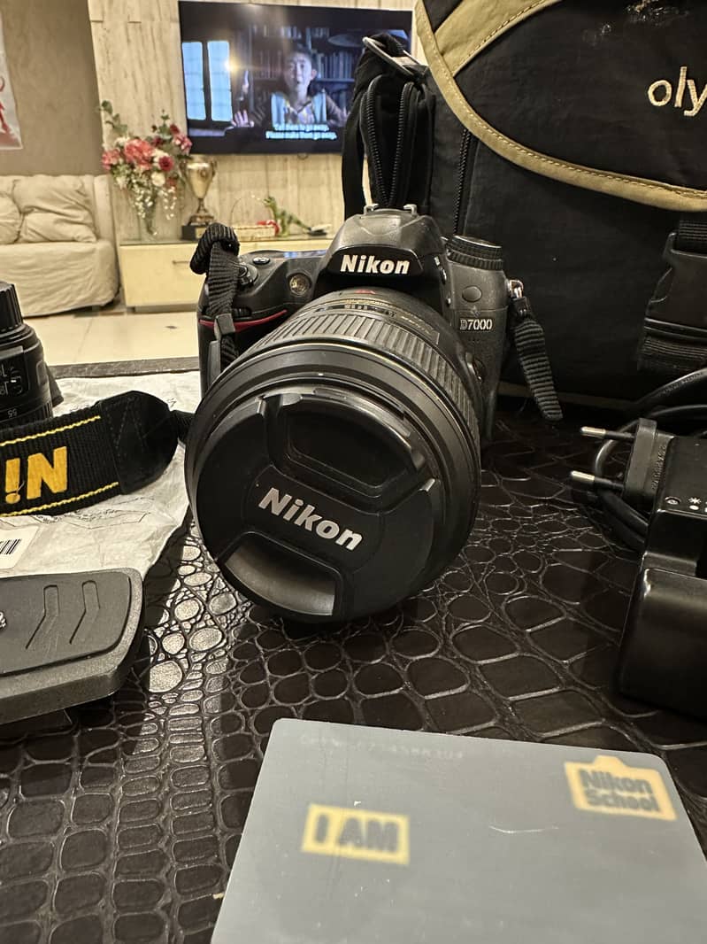 Nikon d7000 with full accessories, bag, 18-55mm lens and 105mm macro 1