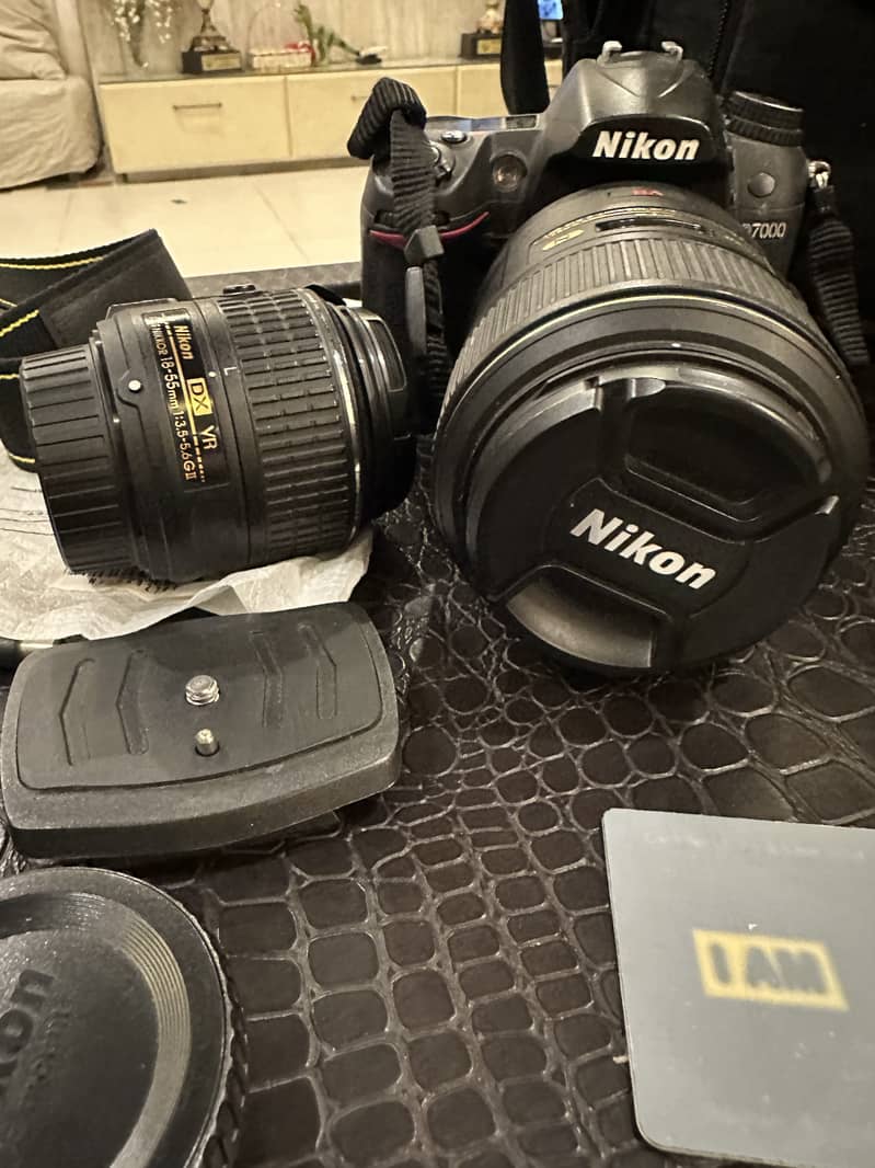 Nikon d7000 with full accessories, bag, 18-55mm lens and 105mm macro 2