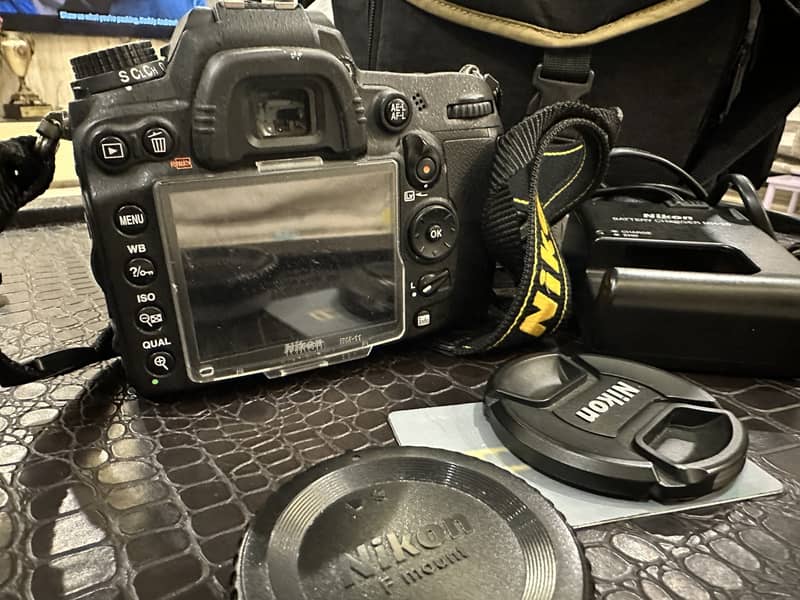 Nikon d7000 with full accessories, bag, 18-55mm lens and 105mm macro 5