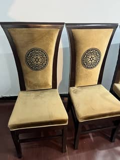 Golden dining chairs