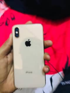 iPhone XS hai dual approved hai all ok hai golden Clr with box 64