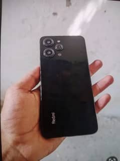 Redmi 12.8/128.   just box open no use 03094700474