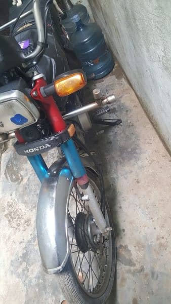 Honda 70 red color total geniun all punjab number he 6