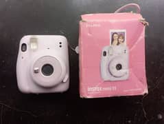 "Fujifilm Instax Mini 11 Instant Camera: Capture Fun Moments Anywhere"