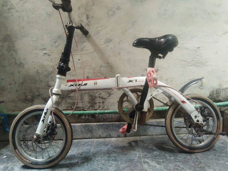 Folding bicycle normal condition . Price 12000. 1