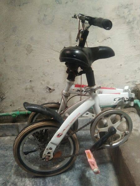 Folding bicycle normal condition . Price 12000. 2