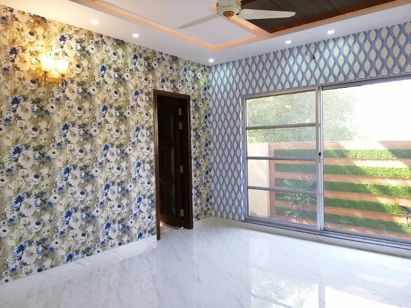 A BEAUTIFUL 1 KANAL LOWER PORTION FOR RENT IN JANIPER BLOCK SECTOR C BAHRIA TOWN LAHORE 12