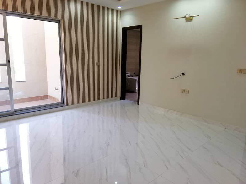 A BEAUTIFUL 1 KANAL LOWER PORTION FOR RENT IN JANIPER BLOCK SECTOR C BAHRIA TOWN LAHORE 20