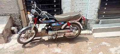 Honda CD 70 model 2014 number plate is 2015