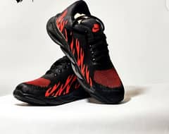 Ignite Your Style: Bold Black and Red Flame Sneakers 0