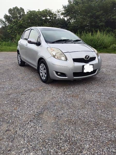 Toyota Vitz F1.0 Model 2009 reg 2013 Lahore number 6