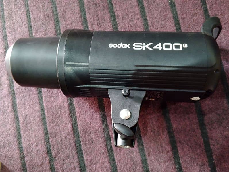 Godox sk 400ii speed light and video light. 3