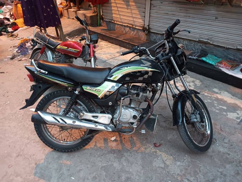 Honda Deluxe 125 ( 5 Gear) 1