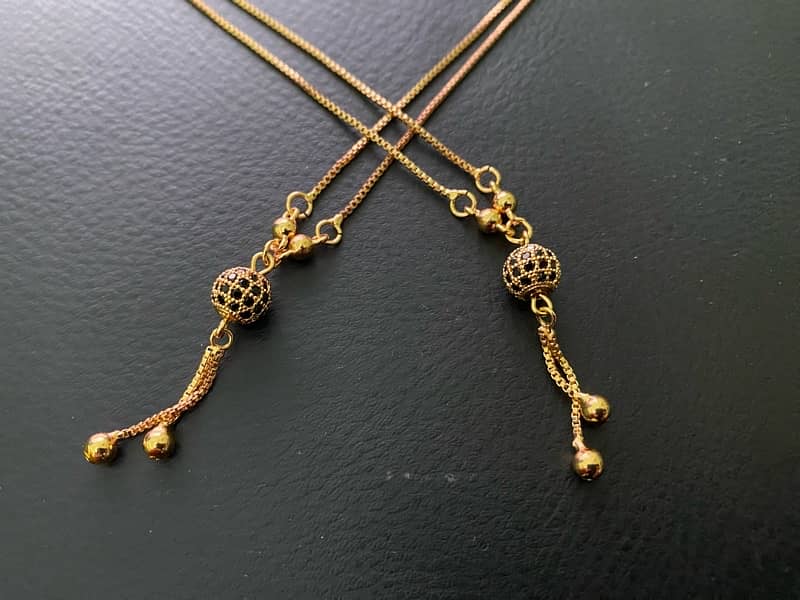 Gold Tassel pendants 1