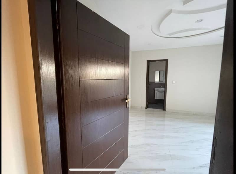 BRAND NEW 2 BED NON FURNISHED APARTMENT FOR SALE IN IQBAL COMMERCIAL BAHRIA TOWN LAHORE 0