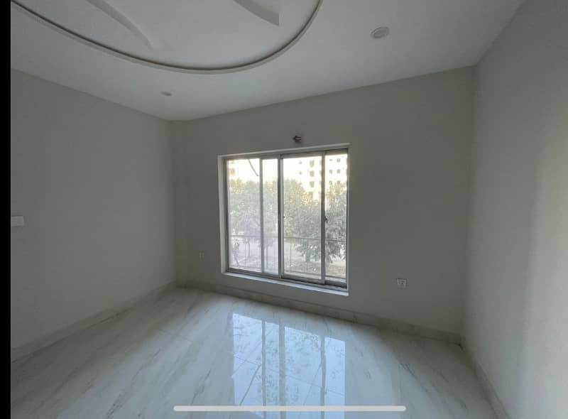 BRAND NEW 2 BED NON FURNISHED APARTMENT FOR SALE IN IQBAL COMMERCIAL BAHRIA TOWN LAHORE 5