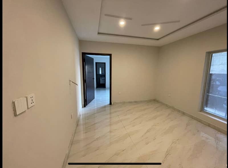 BRAND NEW 2 BED NON FURNISHED APARTMENT FOR SALE IN IQBAL COMMERCIAL BAHRIA TOWN LAHORE 9