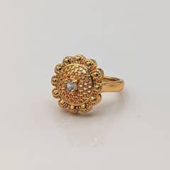 •  Material: Metal
•  Golden Polish
•  Adjustable Ring