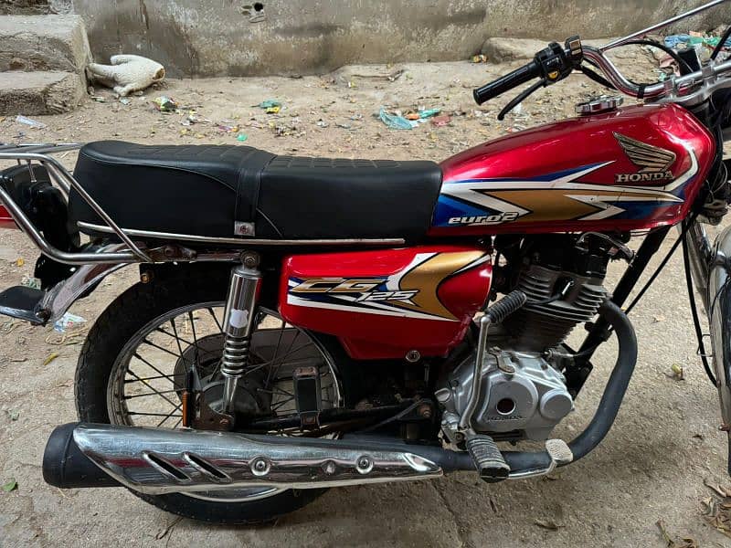 honda cg 125 red color karachi number 9