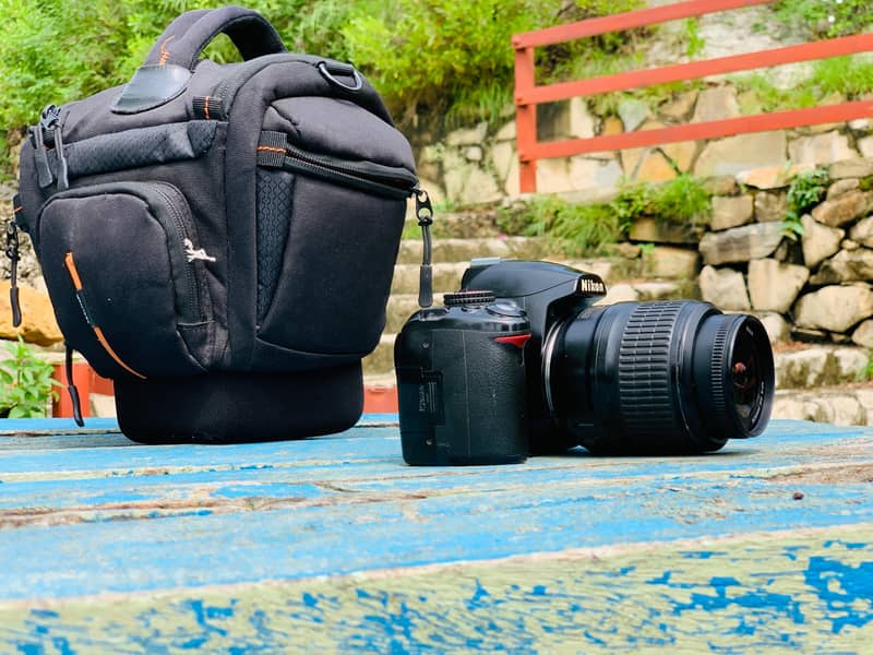 canon d3000 withbox 3