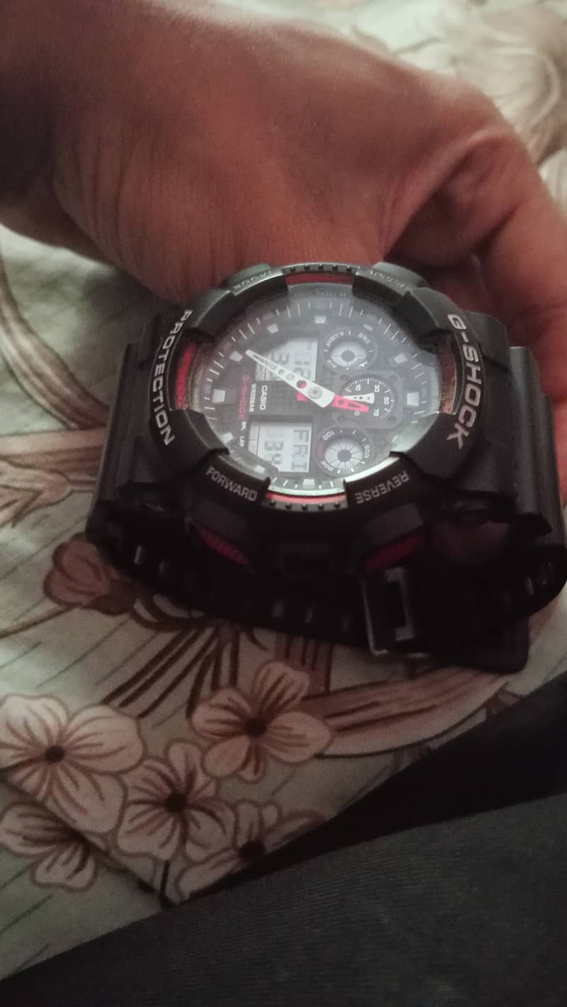 Casio G-Shock GA-100, digital and analog watch 3