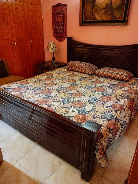 King size wooden bed. 2