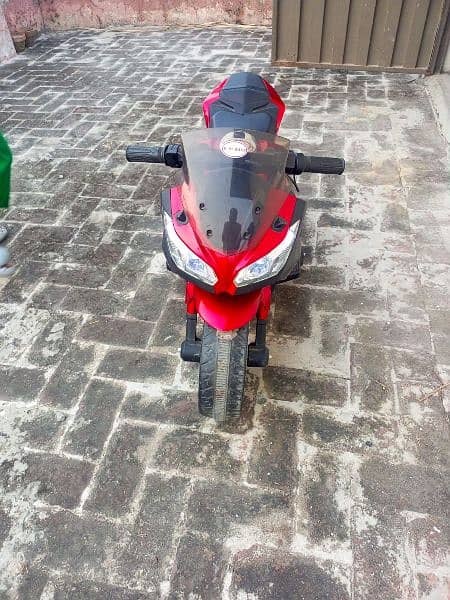 Red and black colour heavy bike with lights 3