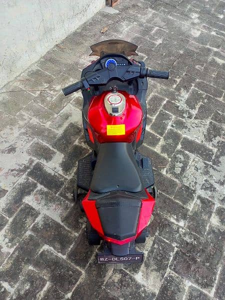 Red and black colour heavy bike with lights 4